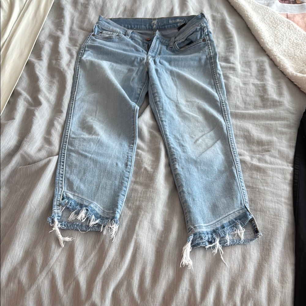 Women's Light Blue Distressed Jeans